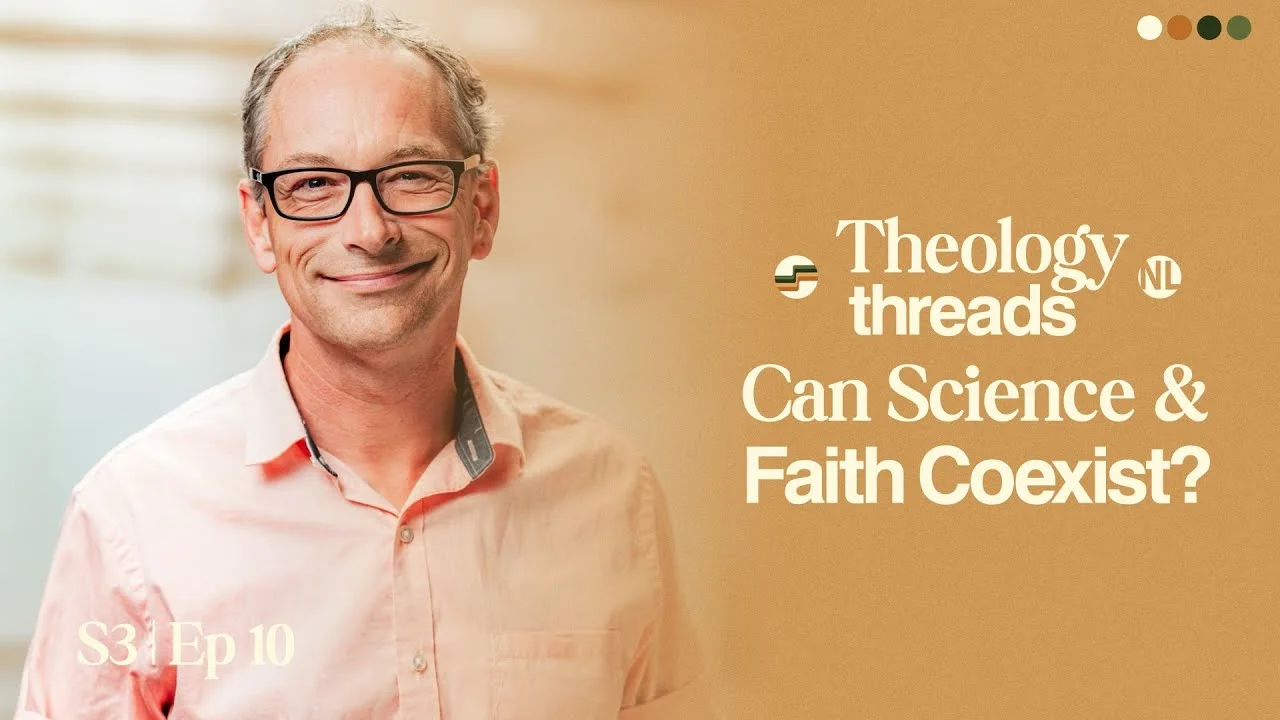 Smiling theologian discusses science and faith coexistence in podcast episode.