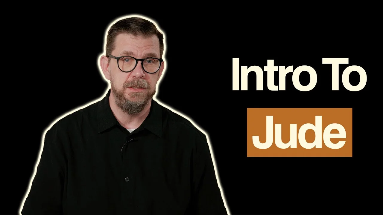 Middle-aged man with glasses in black shirt, "Intro To Jude" text.