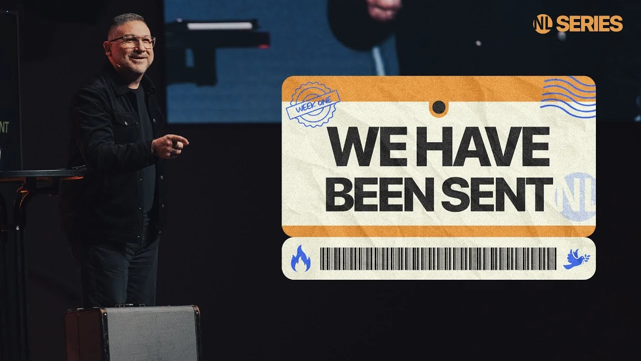 Pastor preaching on stage with graphic text overlay that reads "We Have Been Sent" for New Life Church sermon series.