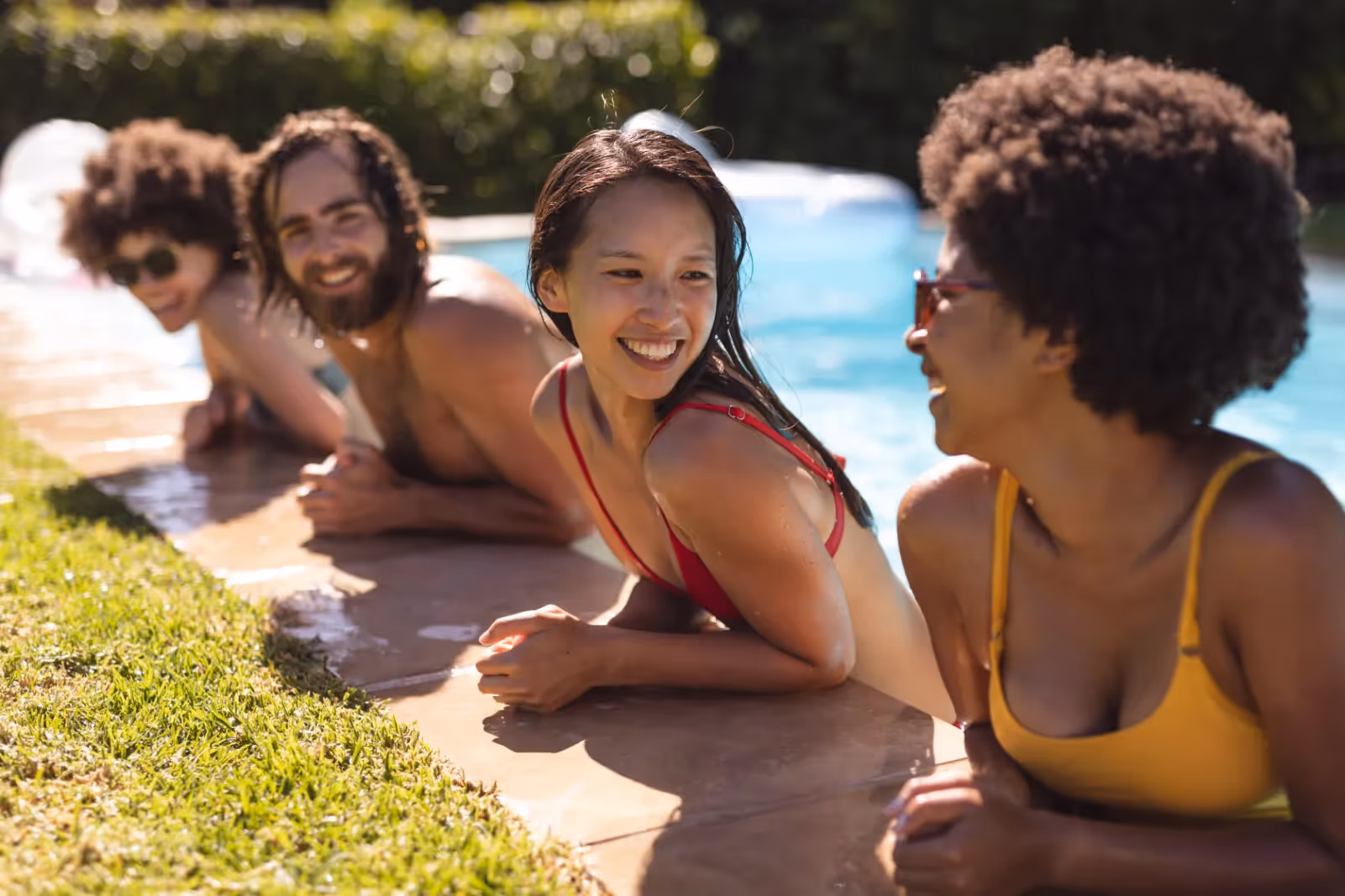 friends by pool stock image
