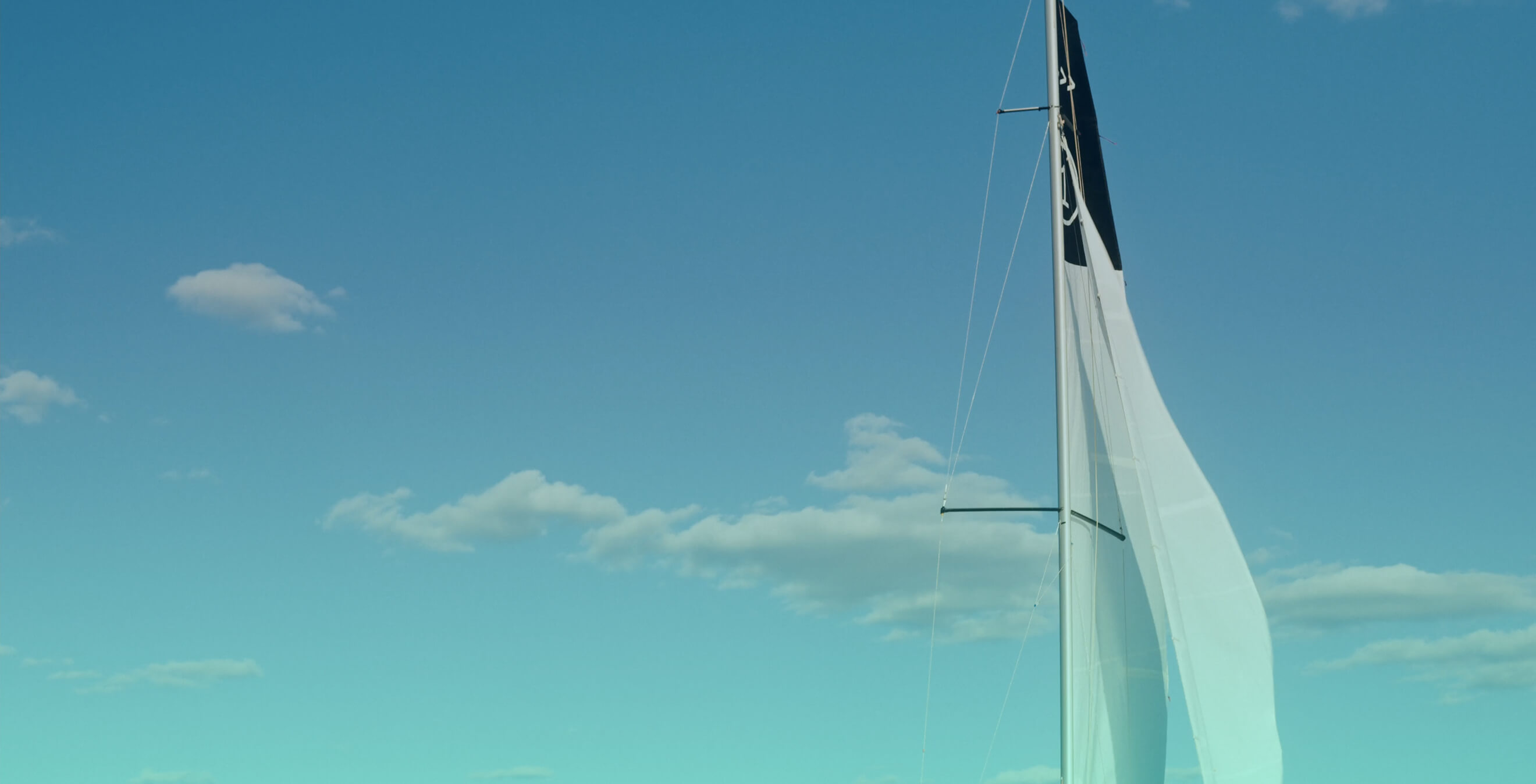 A sailboat is sailing on the water.