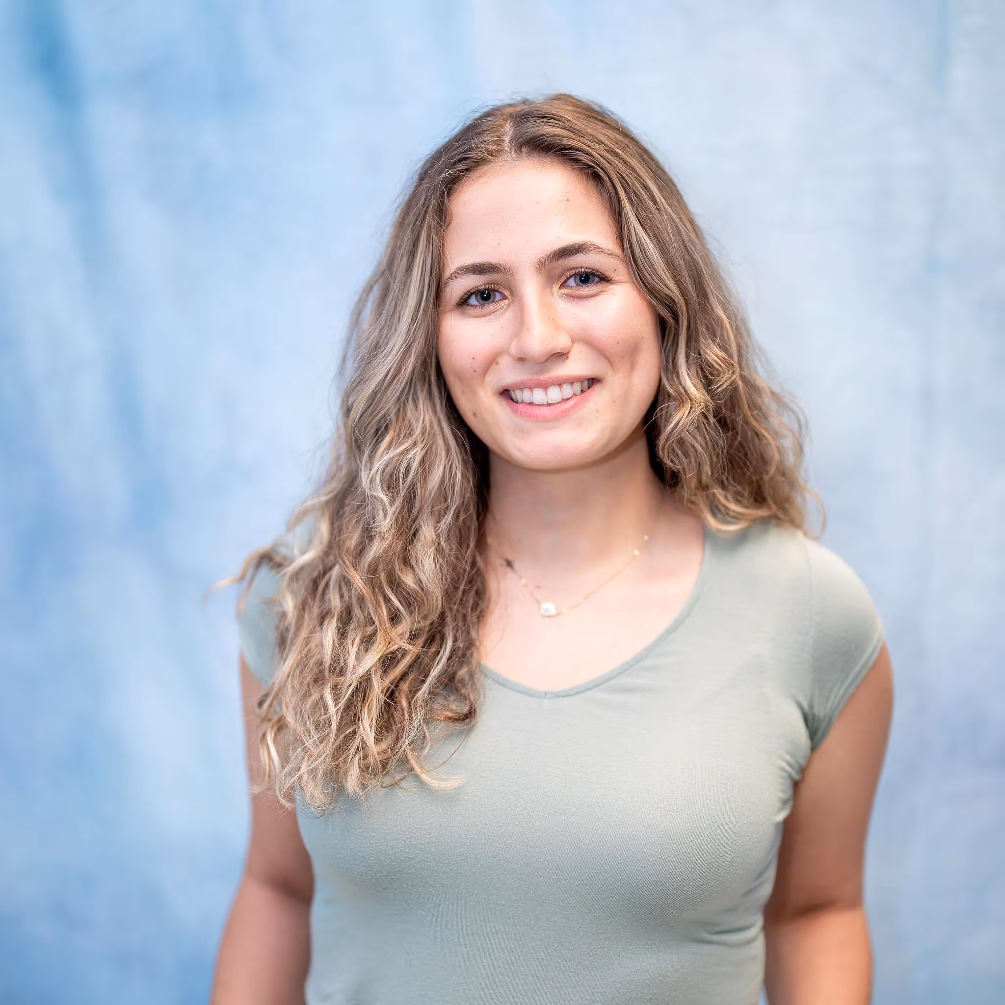 Staff headshot of a woman in professional attire