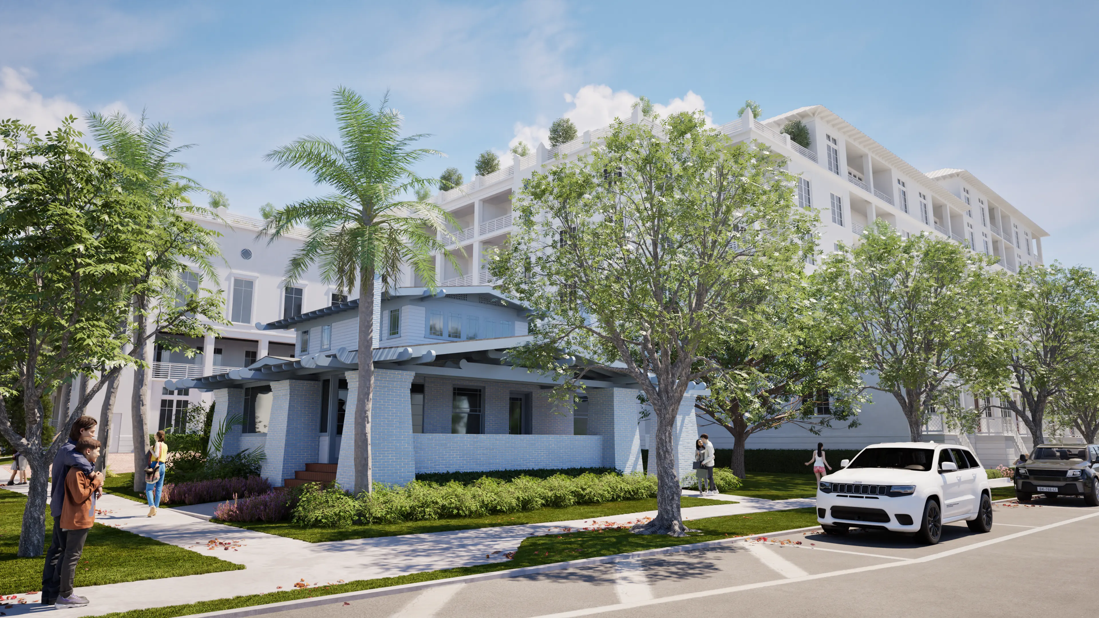 Exterior of blue building at 611 swan with green trees along the street.