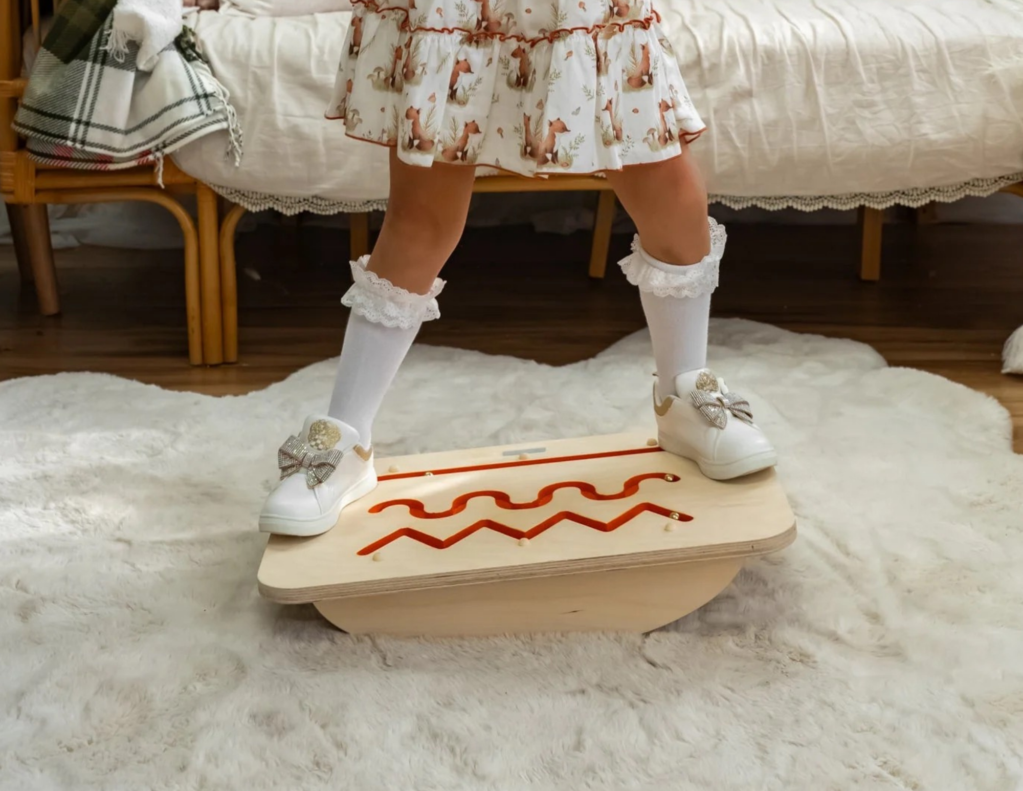 Child practicing balance and coordination on a FlexyMinds balance maze board to support brain development and focus.