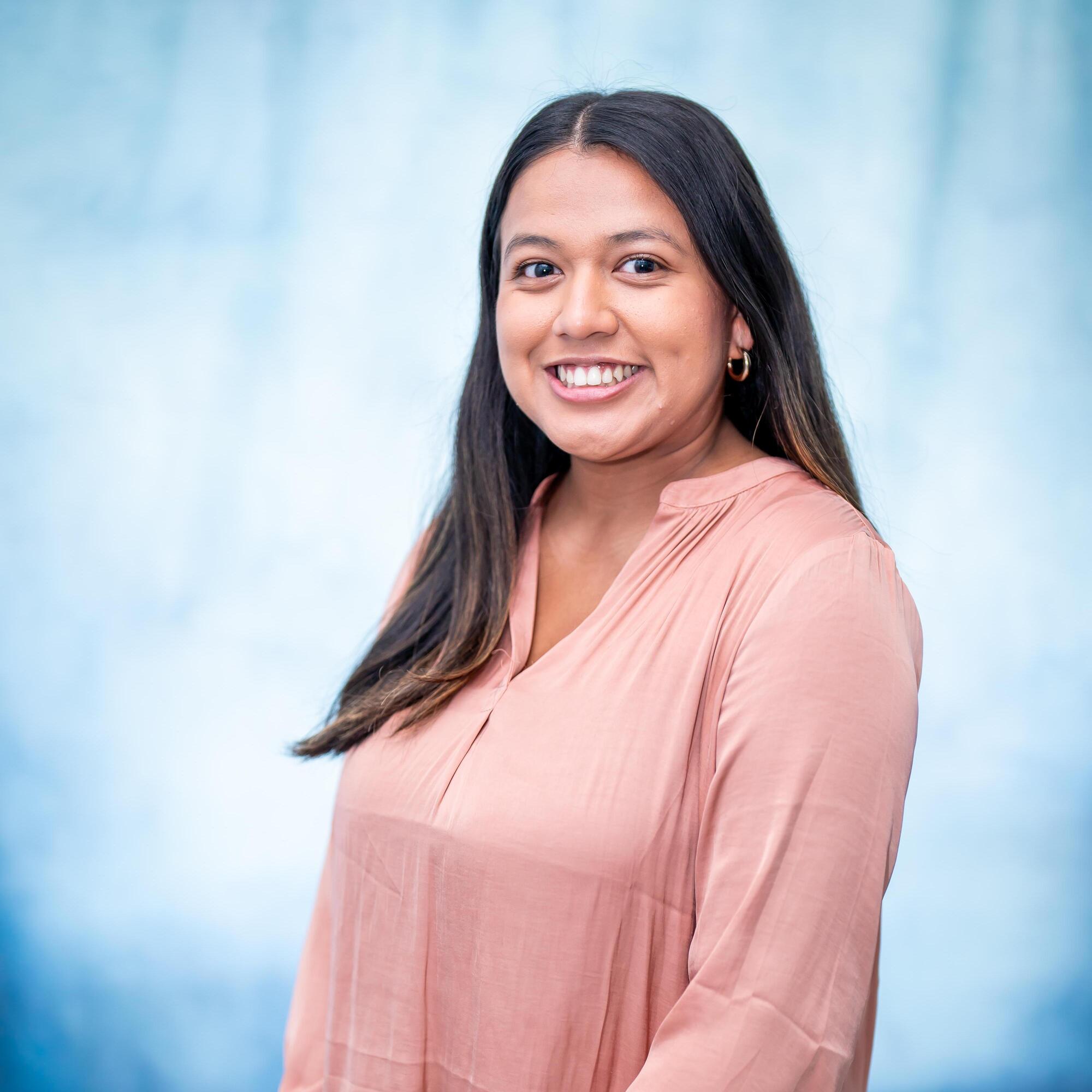 Professional headshot of staff member Jana Cruz