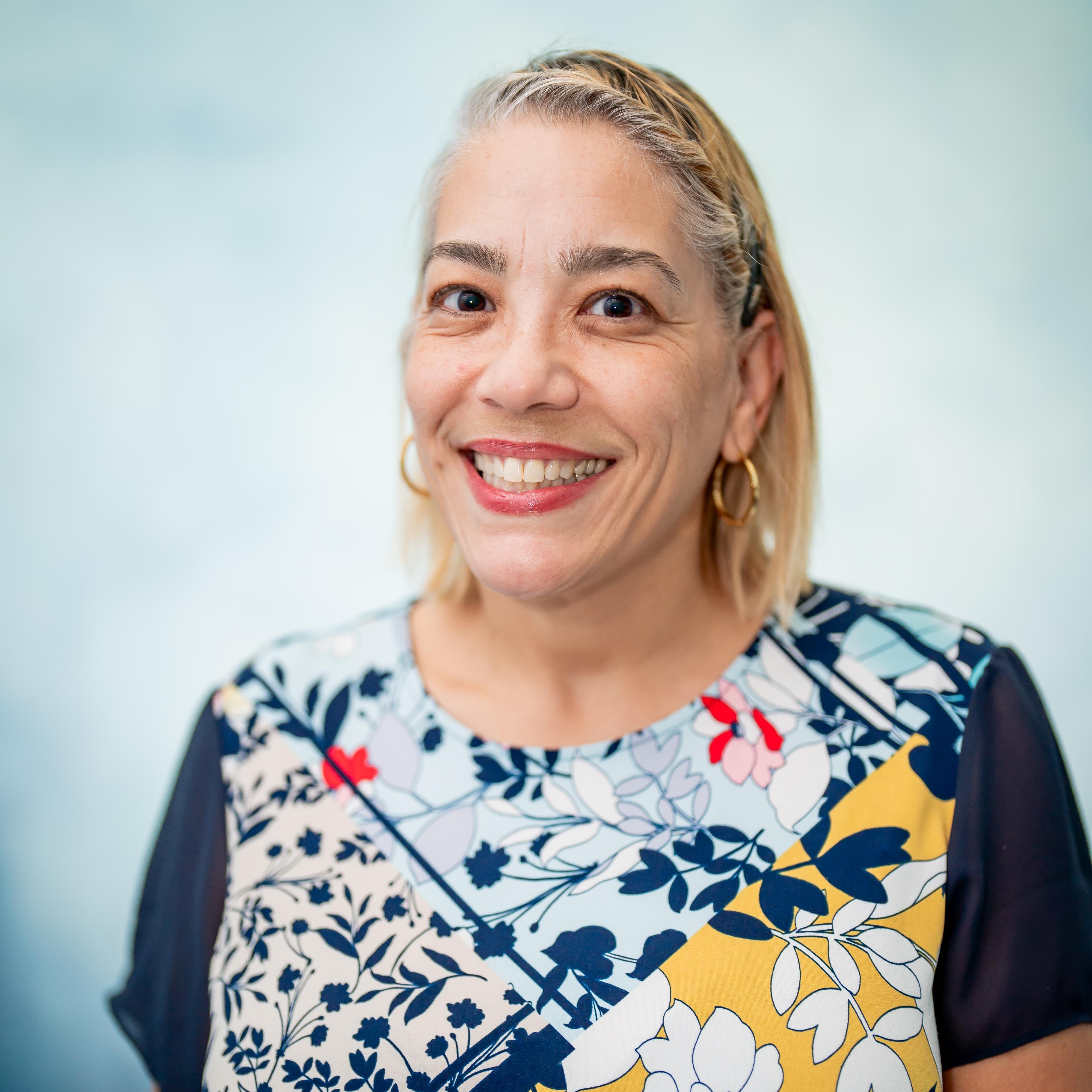 Professional headshot of Katherine Rodriguez smiling