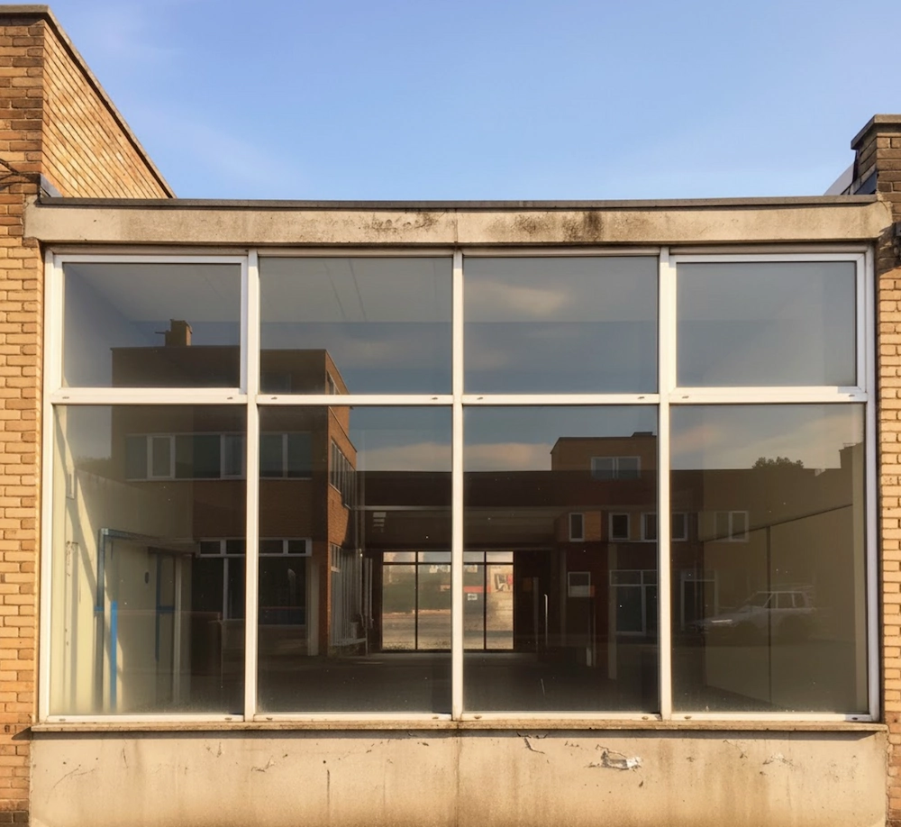 Commercial building windows after professional window cleaning, with clear, streak-free glass and restored visibility on exterior windows in Vancouver.
