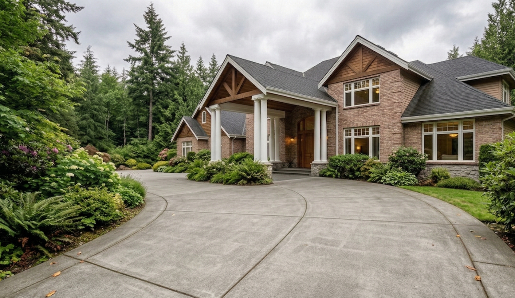 House roof with dark asphalt shingles and a brick chimney partially covered by climbing ivy.