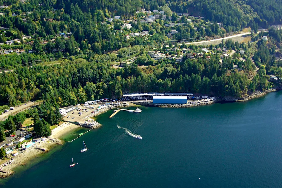 Aerial view of Lion’s Bay waterfront and forested mountains; trusted exterior, window, roof, and gutter cleaning services.