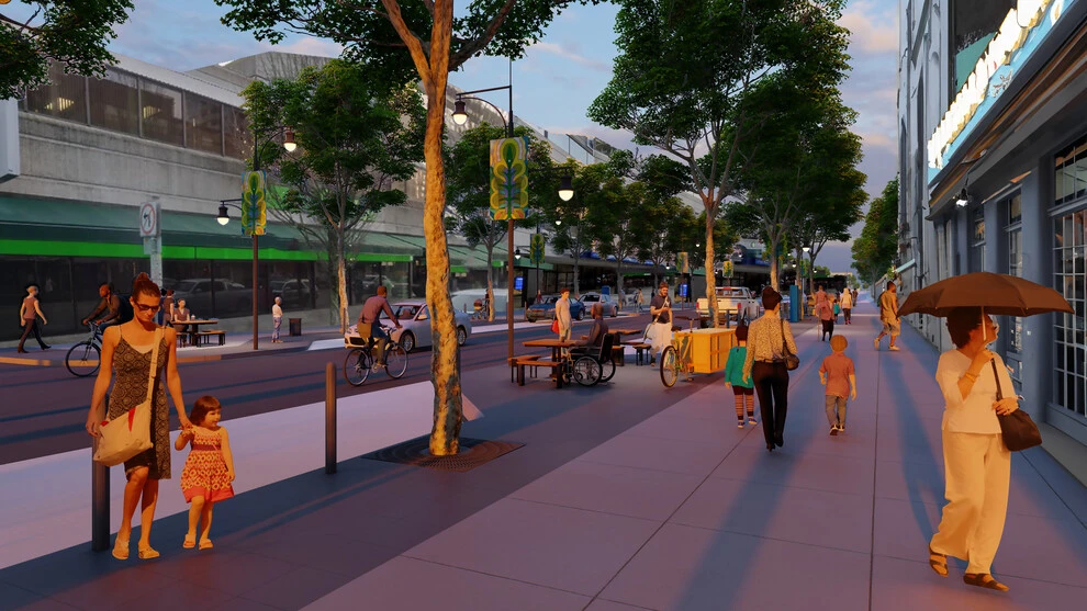 People walking and shopping in Uptown New Westminster at sunset; window, roof, and exterior cleaning specialists.