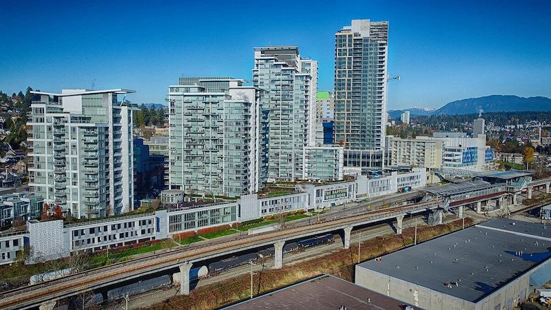 Sapperton neighbourhood skyline with SkyTrain tracks in New Westminster; reliable exterior and soft wash cleaning.