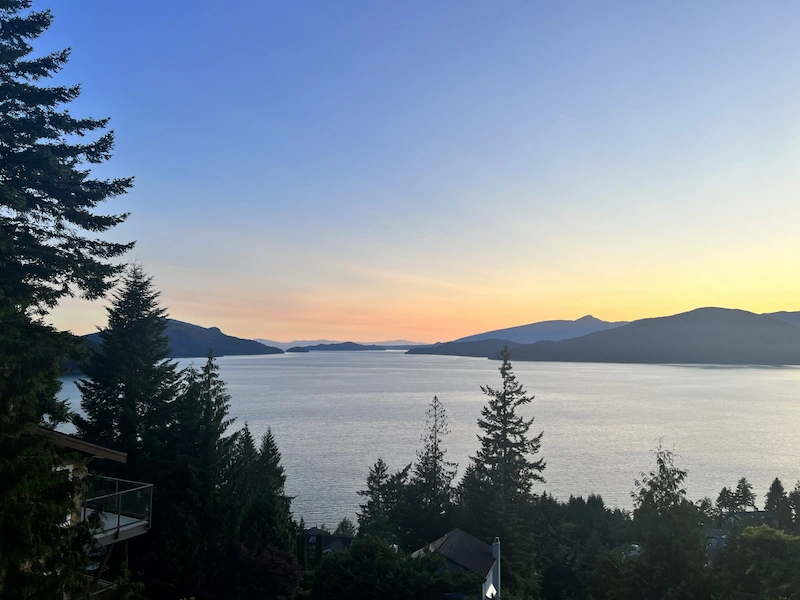 Peaceful lookout from the Oceanview area of Lion’s Bay at sunset; trusted local professionals for window and exterior cleaning.