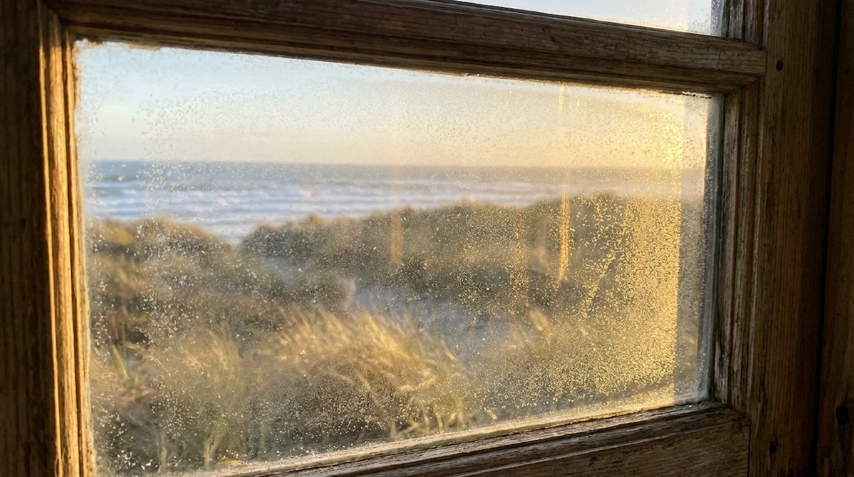 Salt film on coastal window glass from Pacific spray carried inland