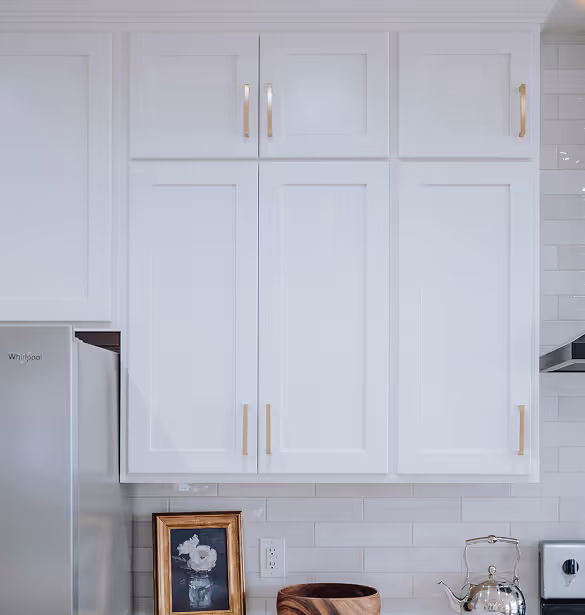 Clean white kitchen cabinets