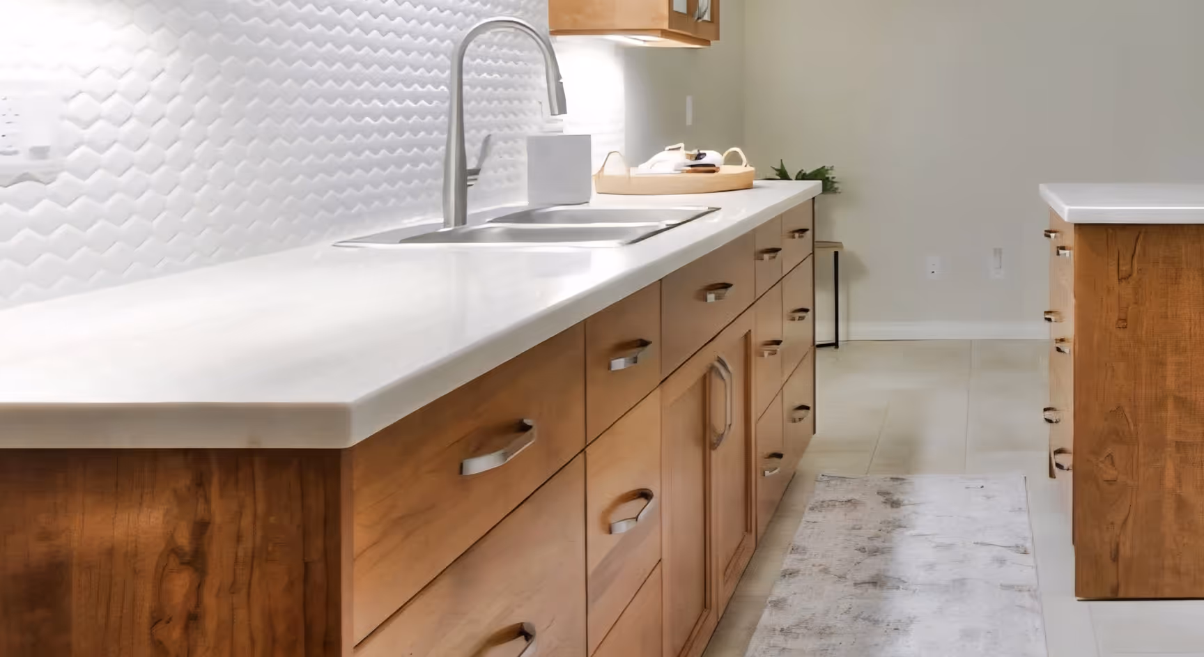 a bathroom with wooden cabinets