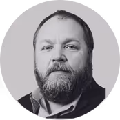 Headshot of smartly dressed man smiling