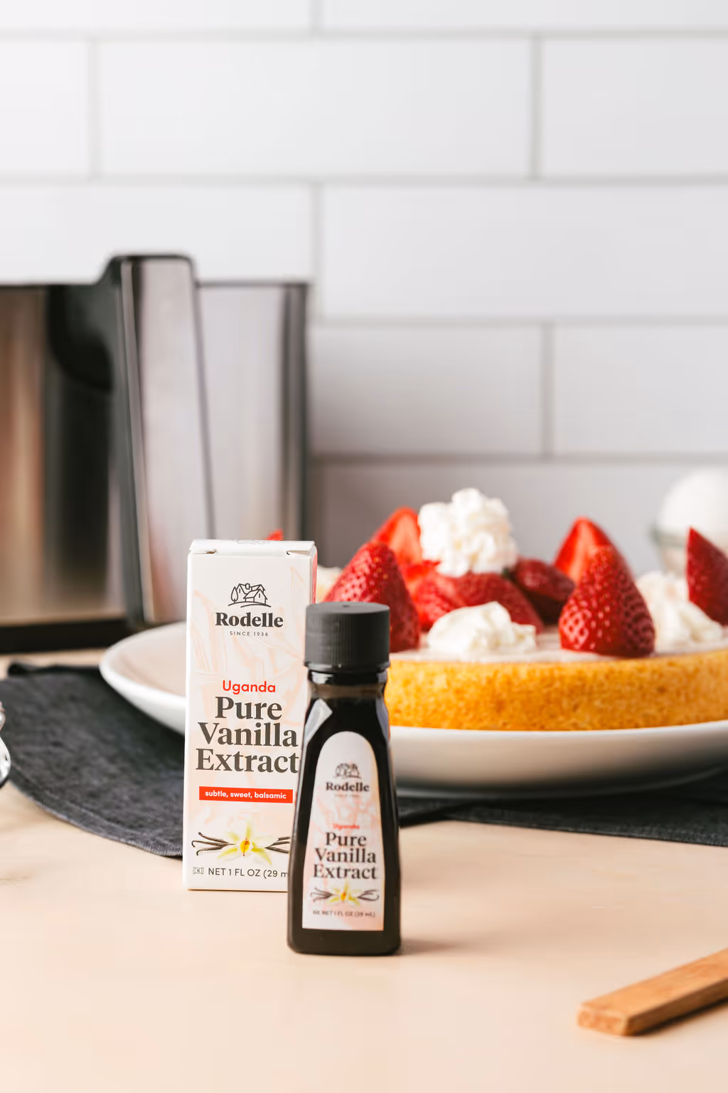 A picture of some vanilla from Rodelle next to some white cake taken by Gaze Marketing
