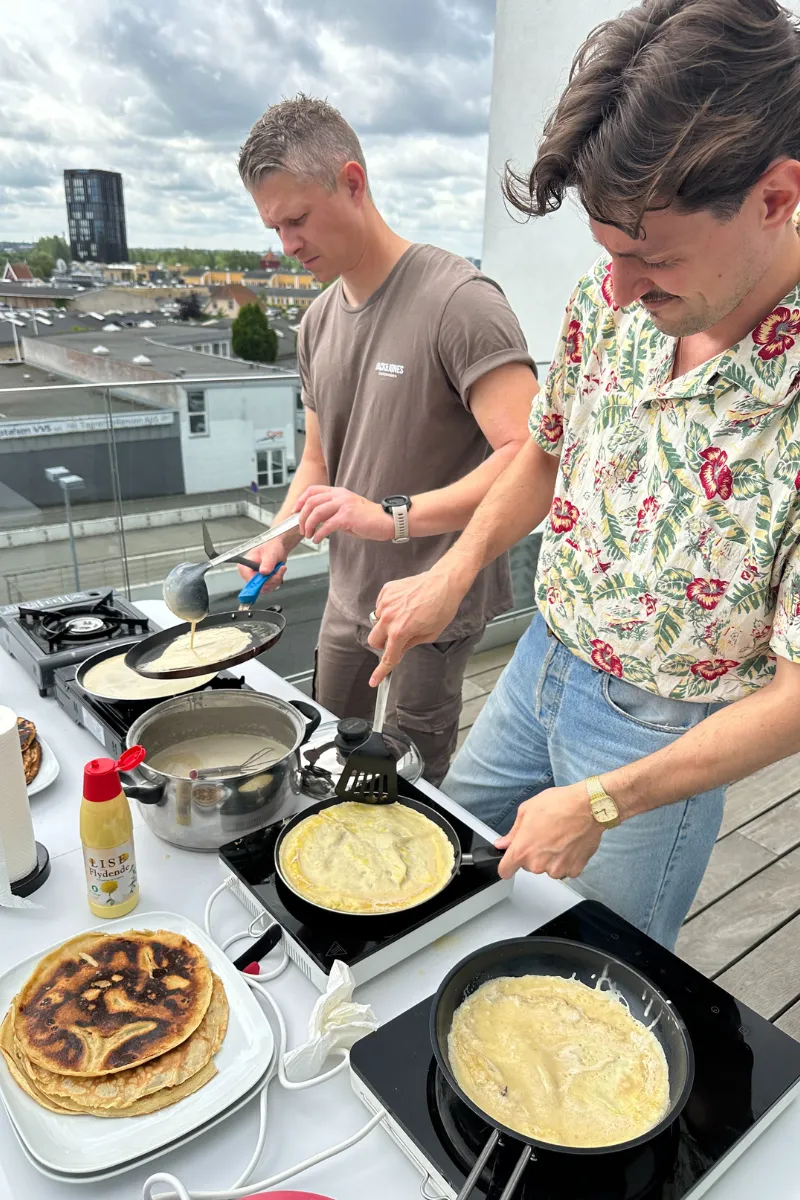iPaper team members serving pancakes
