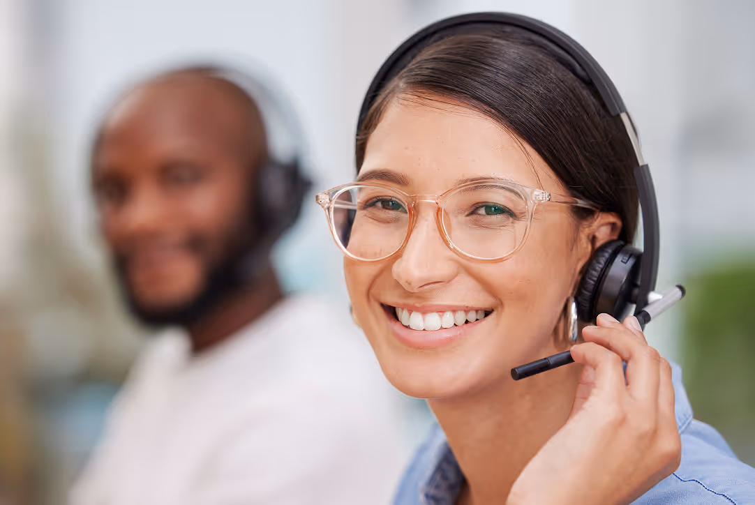 Customer service representatives with headsets