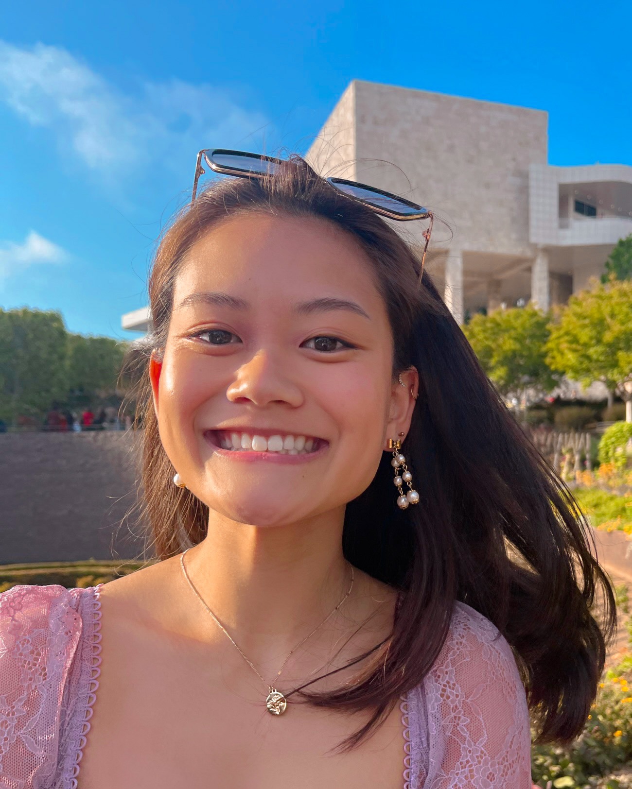 Janie smiling in the gardens at the Getty in Los Angeles.