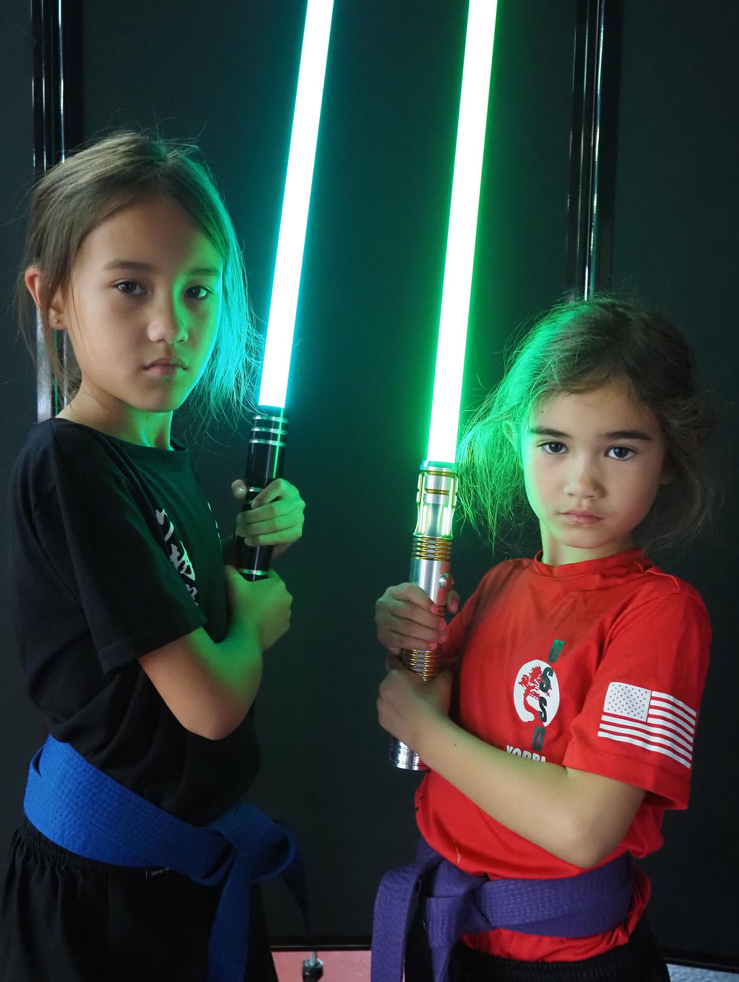 Two friends having fun at a ninja night event