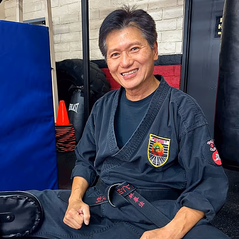 Older gentleman enjoying his time in the dojo before training.