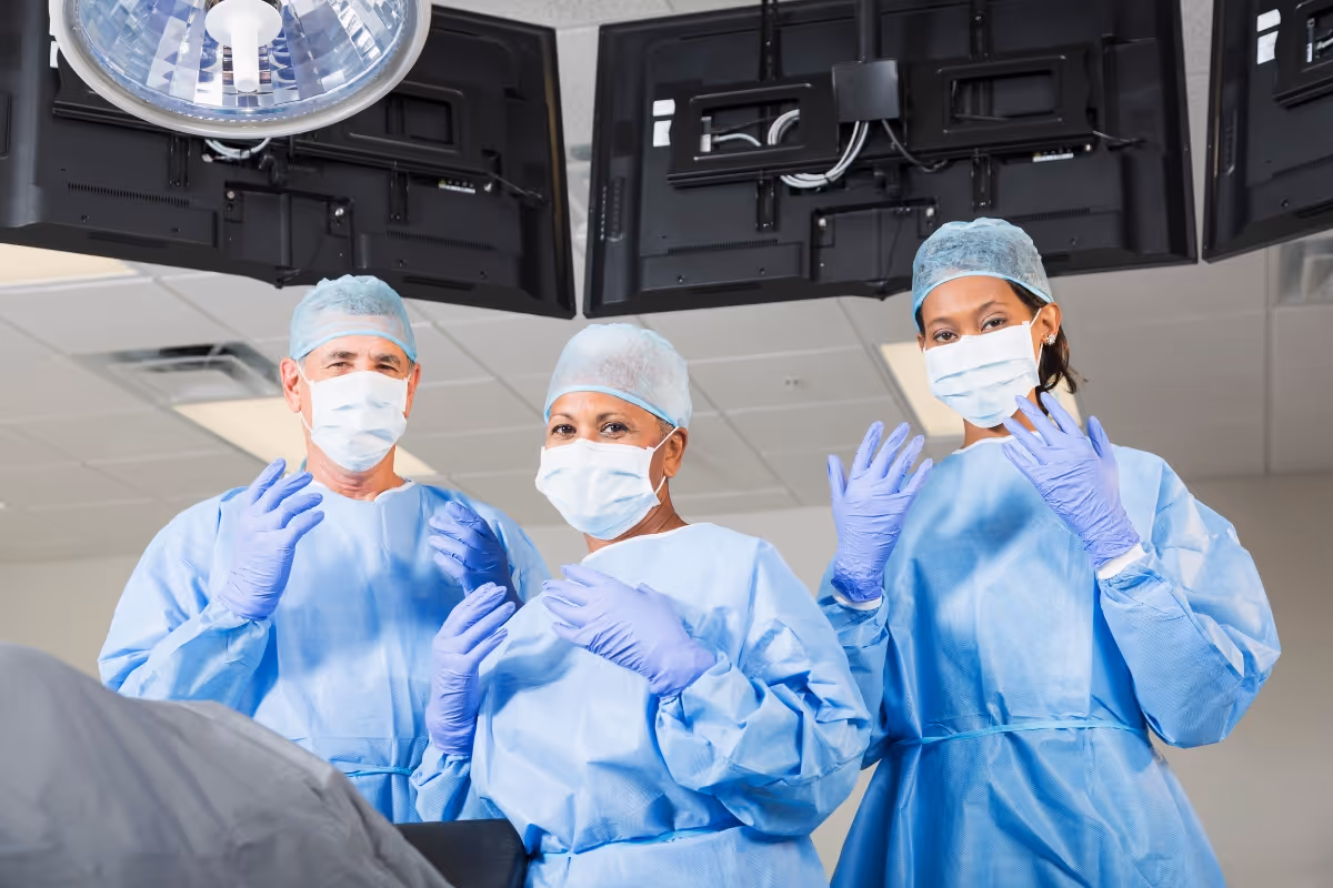 Private surgeons ready to operate in a clean operating room