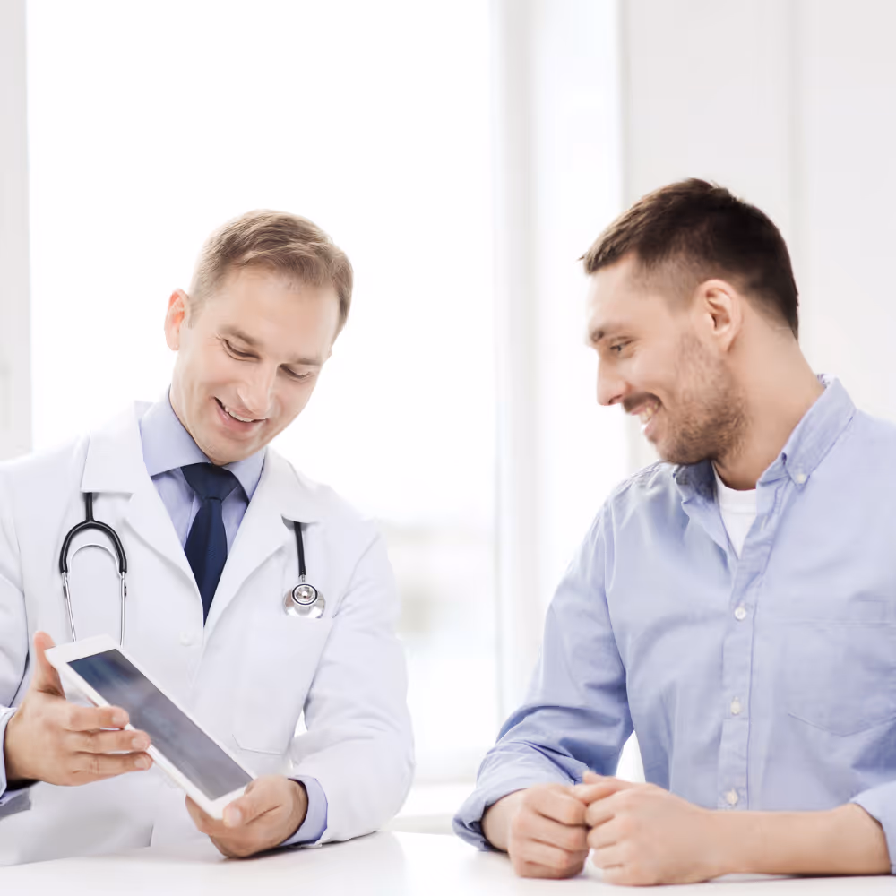 Surgeon consulting with patient