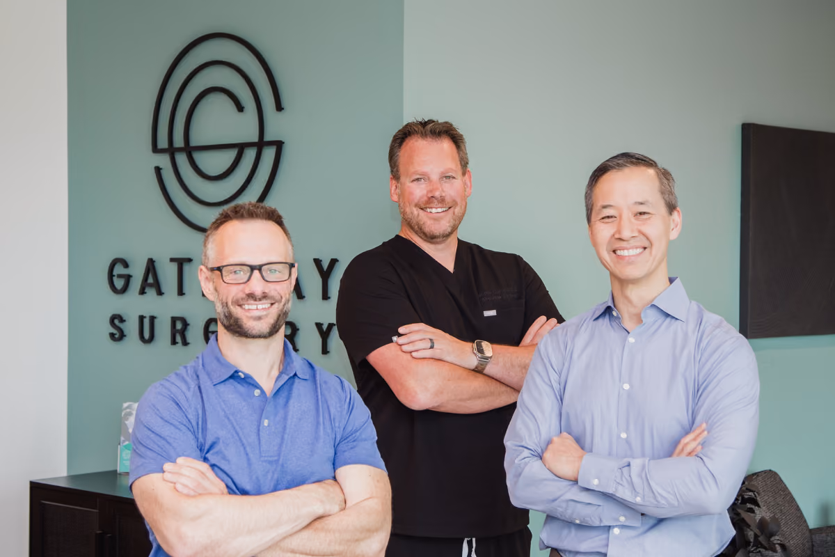 Gateway clinic front desk with surgeons Dr. Leblanc, Dr. Costa, and Dr. Lo.