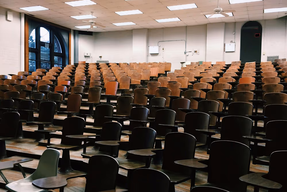 Empty lecture hall prepared for medical presentation in Detmold, Germany.