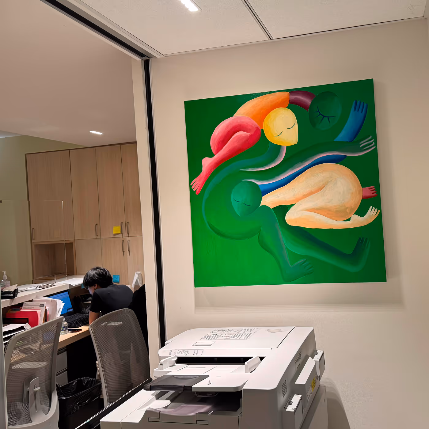 Female nurse at New York Headache Center answering patient call.
