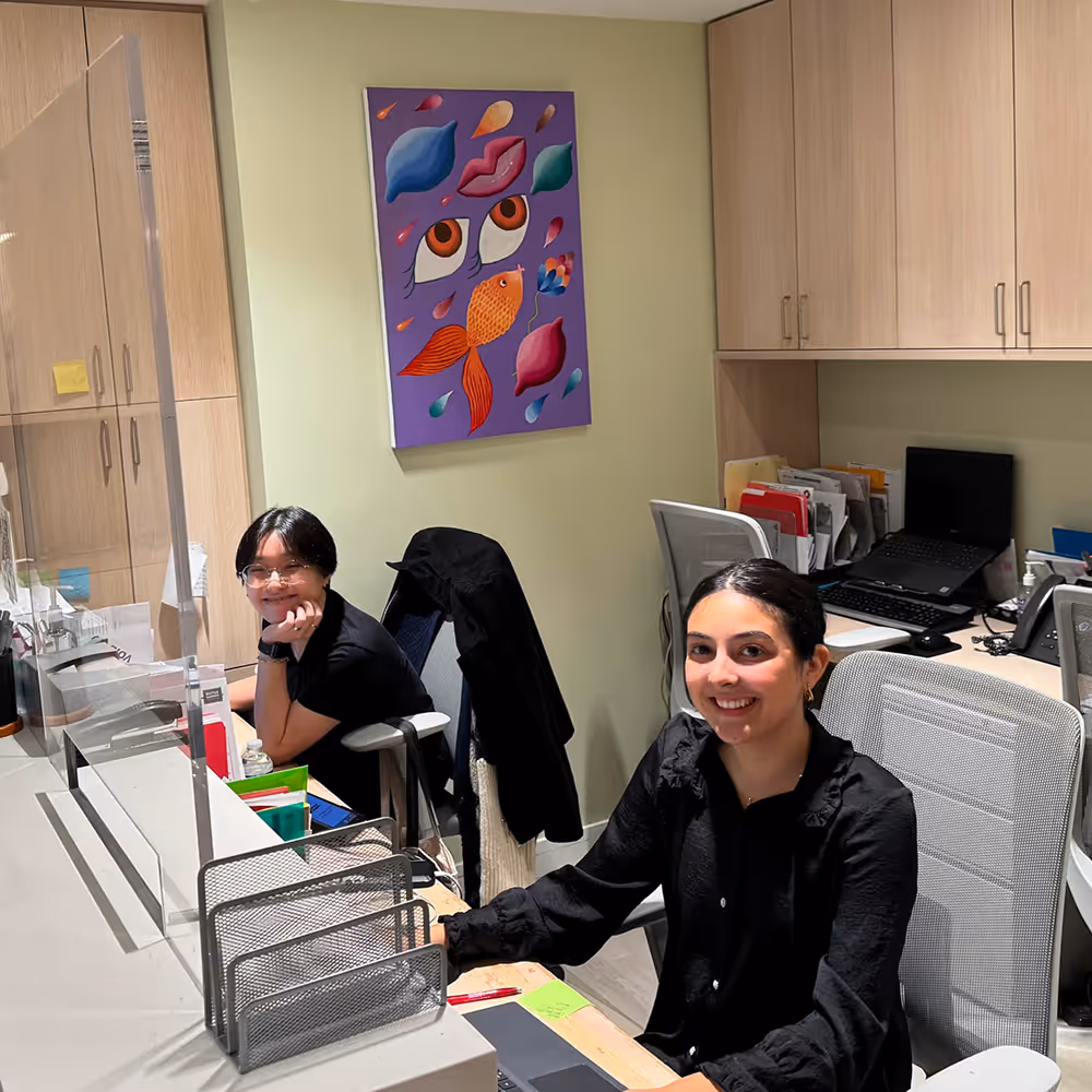 Female nurse at New York Headache Center answering patient call.