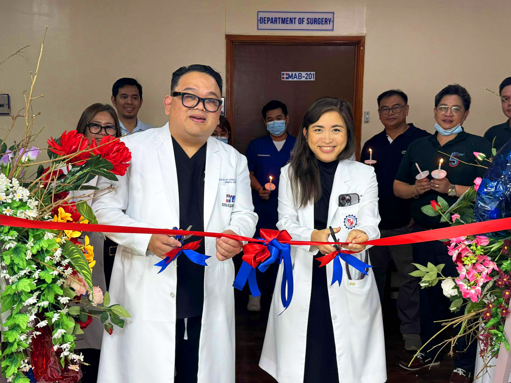 Concise version: "NEMC 5th anniversary logo featuring stylized number 5 with core values: Family, Integrity, Value, Excellence