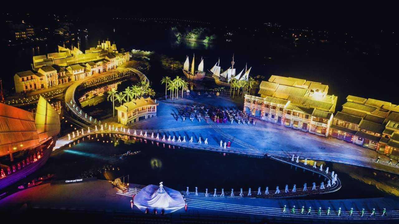 Aerial view of the Hoi An Memories Show on its vast outdoor stage at night.