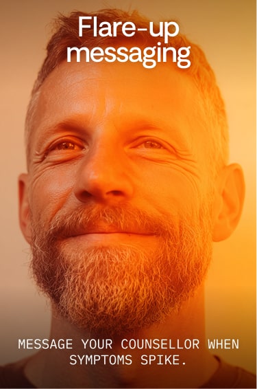 Close-up of a smiling man with a beard under orange light, with text about flare-up messaging advising to message your counsellor when symptoms spike.