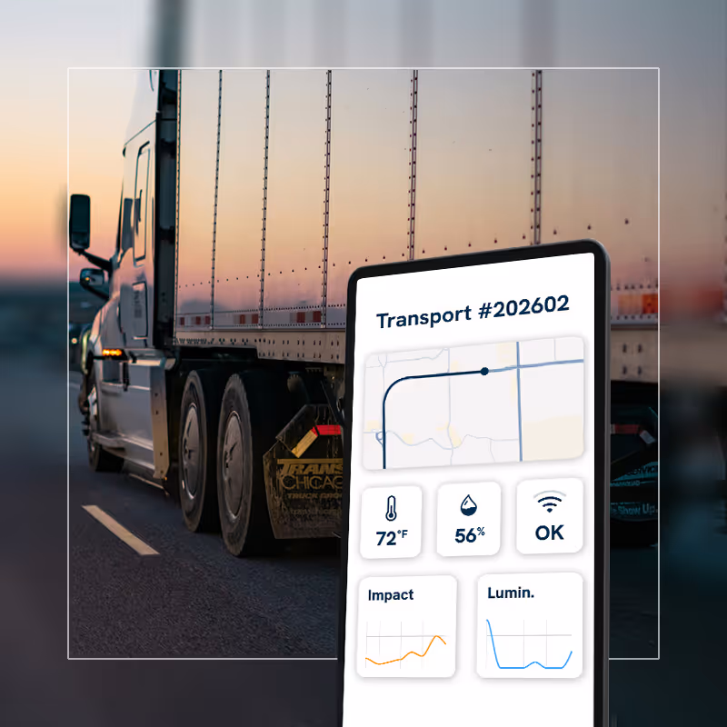 Truck transporting goods and mobile displaying dashboard of the monitoring system