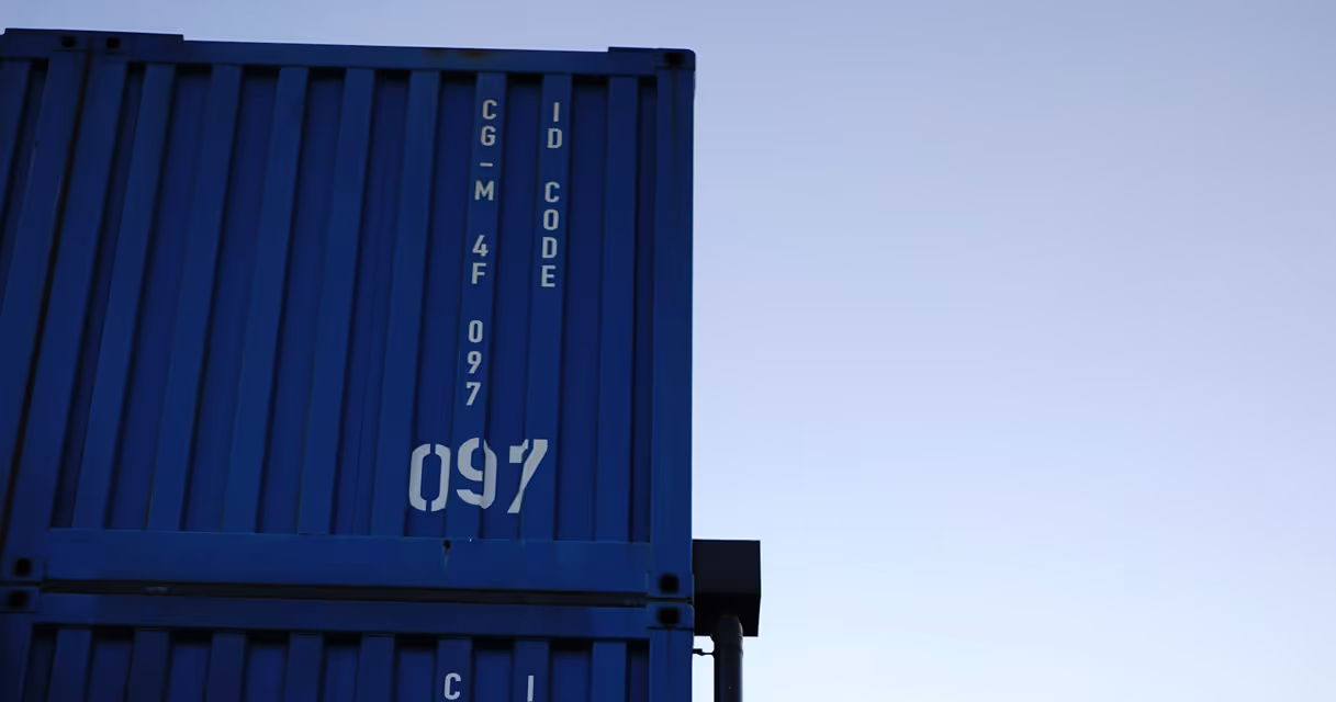 Containers stacked in warehouse