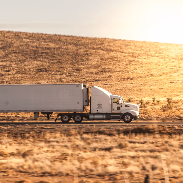Semi truck in summer fields