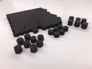 Hule hexagonal negro™