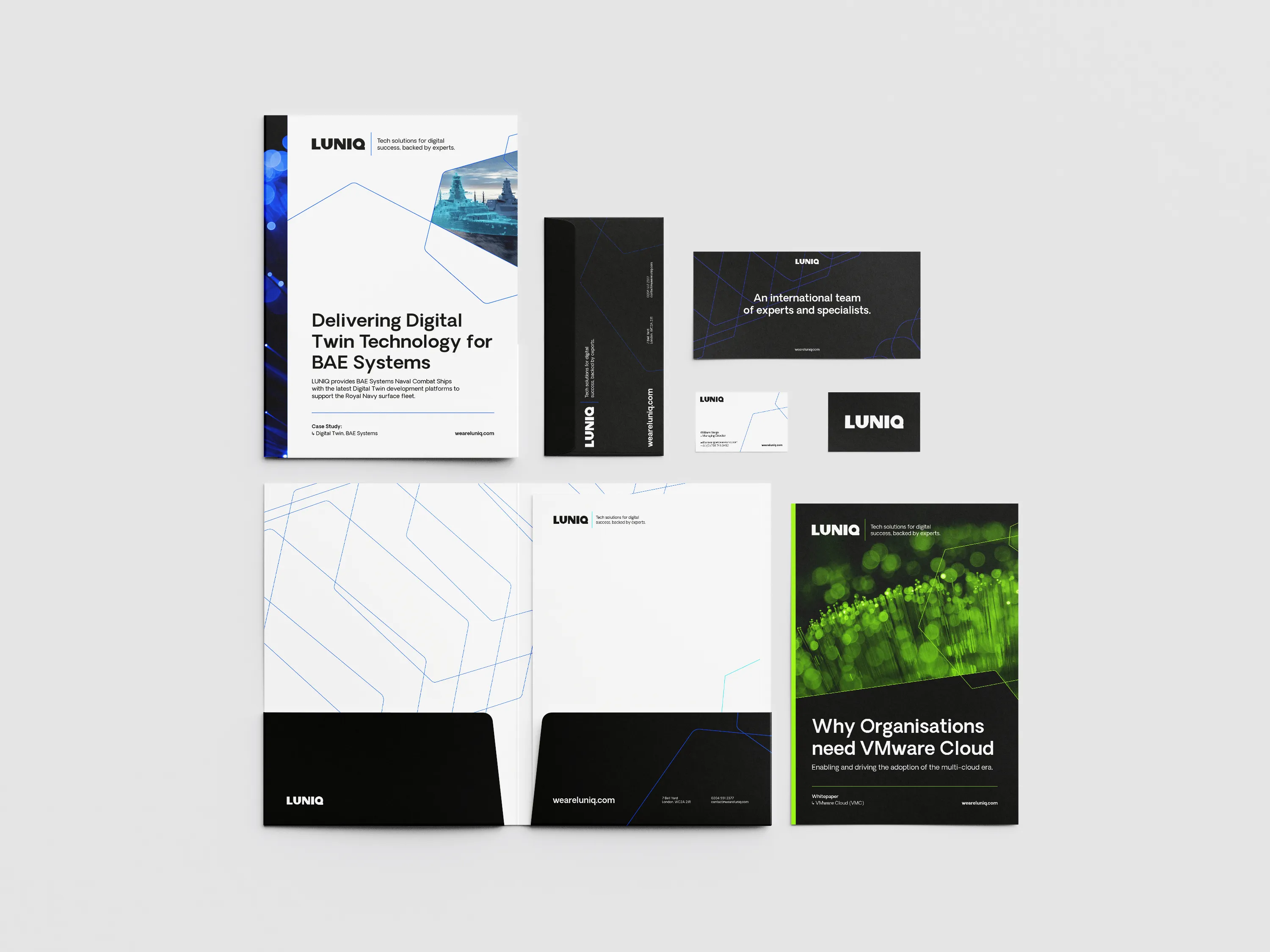 Volander branded stationery and technical specification sheet, featuring a dark blue presentation folder, embossed business cards, and a printed document outlining platform details for a hybrid armed aircraft.