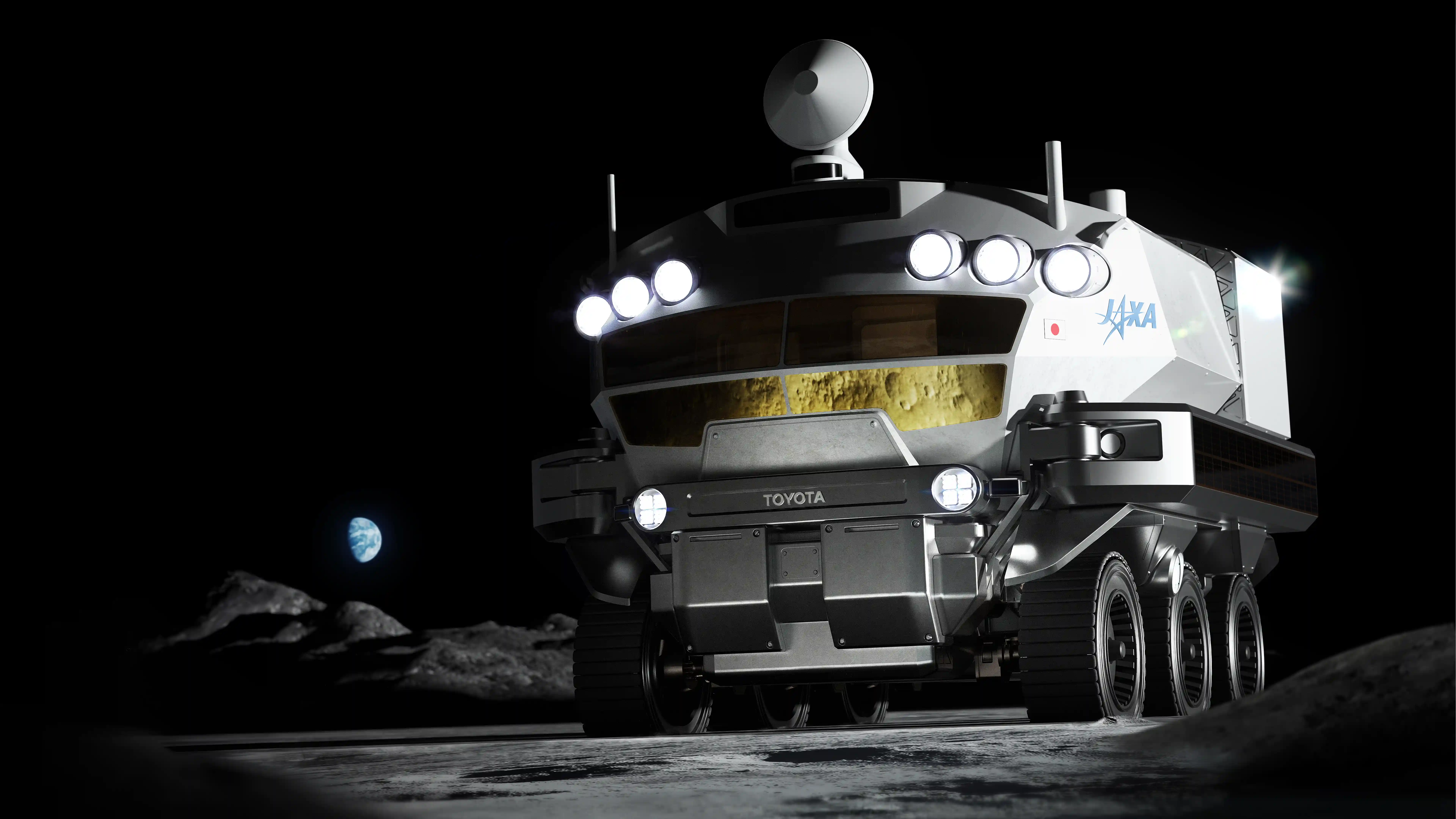 Tlakový lunární rover Lunar Cruiser od Toyoty a JAXA na povrchu Měsíce. (Vizualizace)