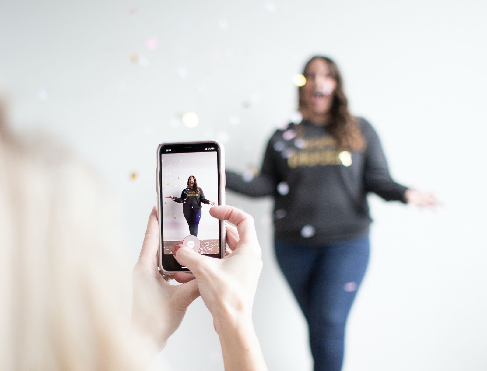 A woman creating a tiktok for her ecommerce brand