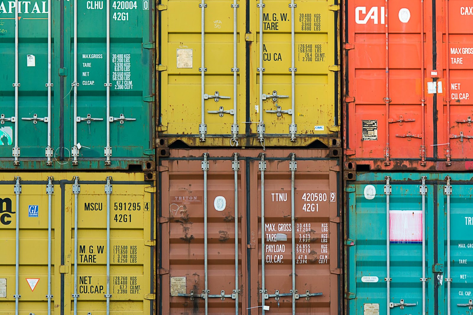 freight containers stacked on top of one another