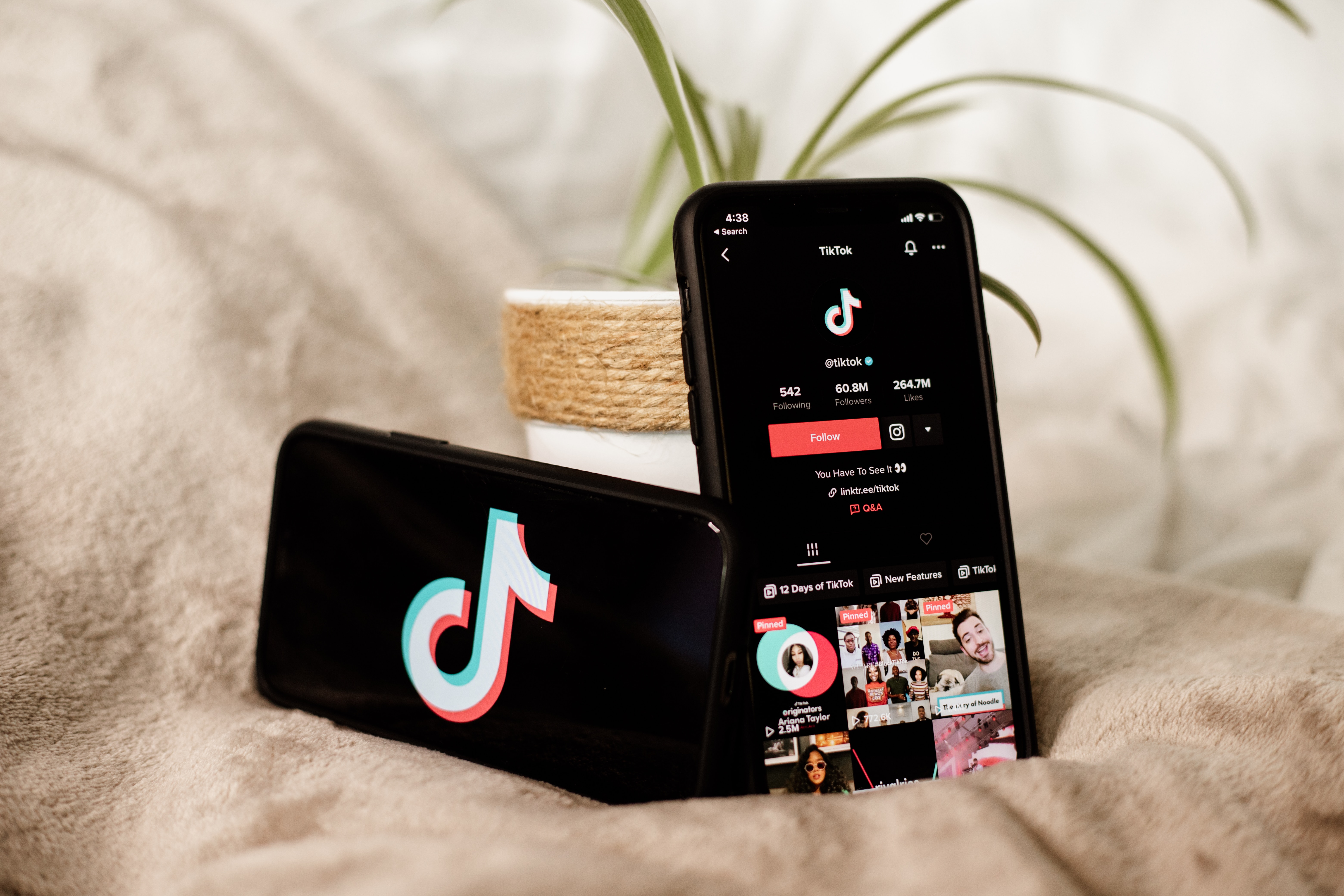 TikTok ads image with two phones showing the TikTok app