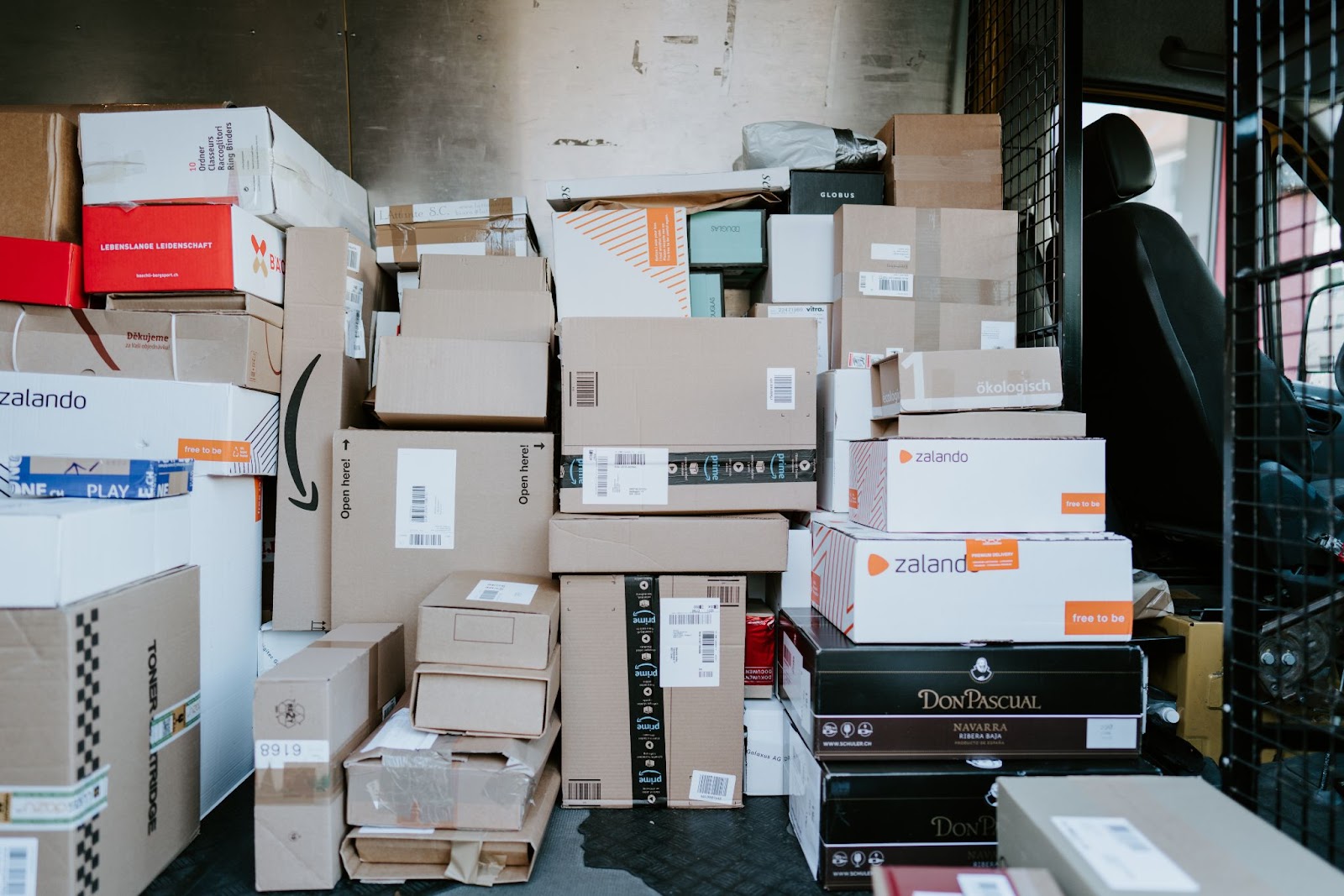 packages in the back of a delivery van
