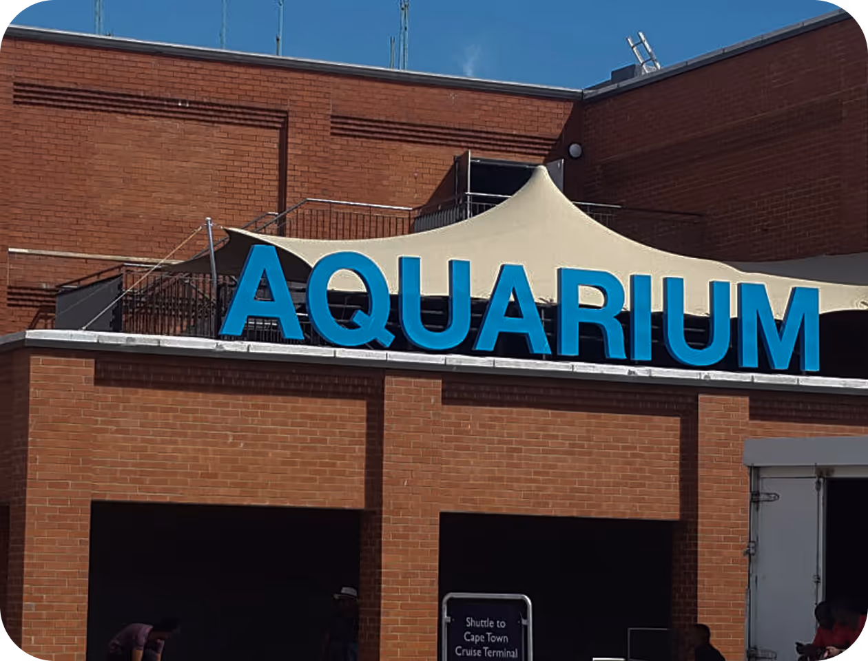 A building with a sign that says muriaqua above it.