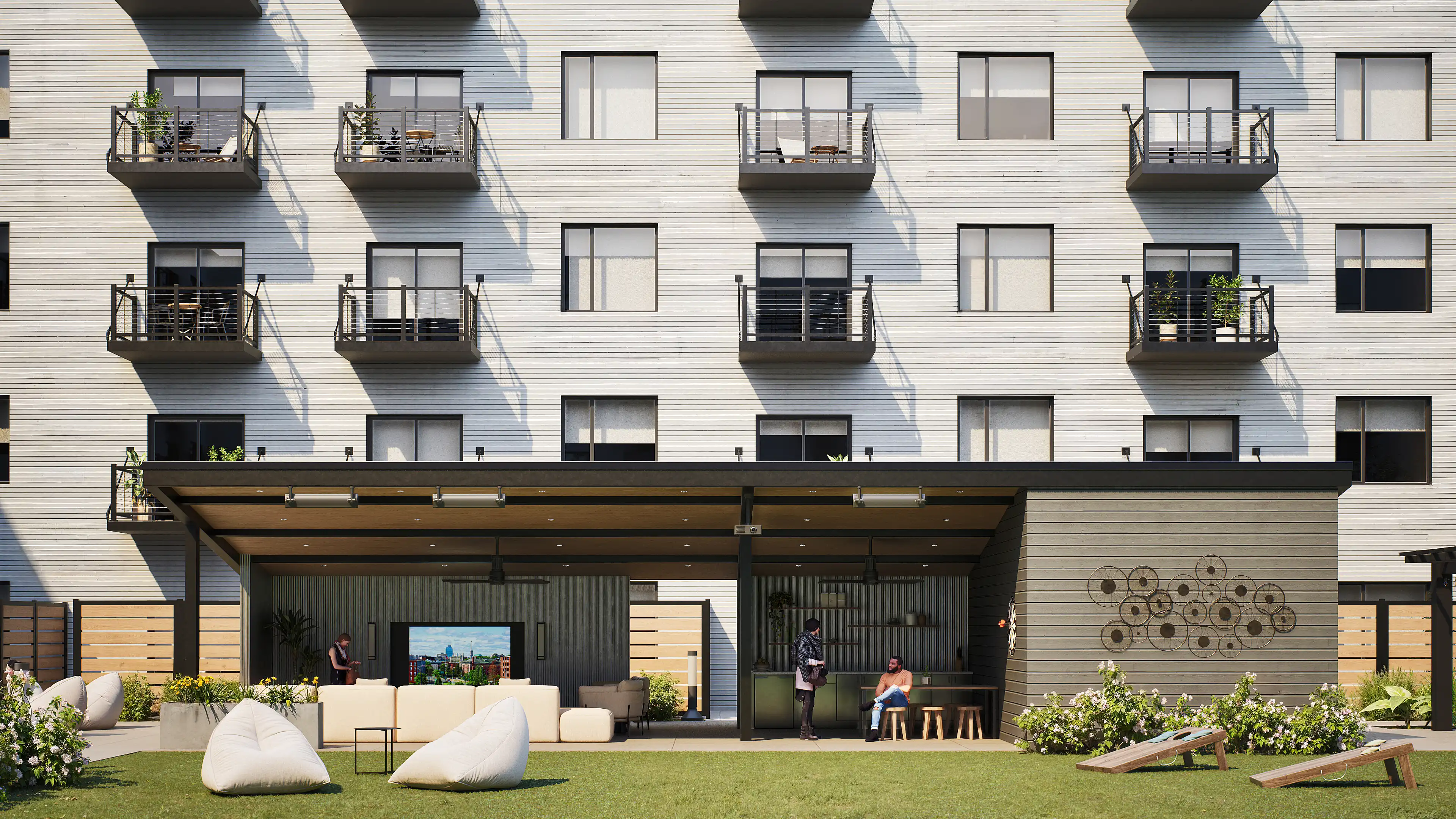 Cozy rooftop firepit seating area at dusk with ambient lighting.