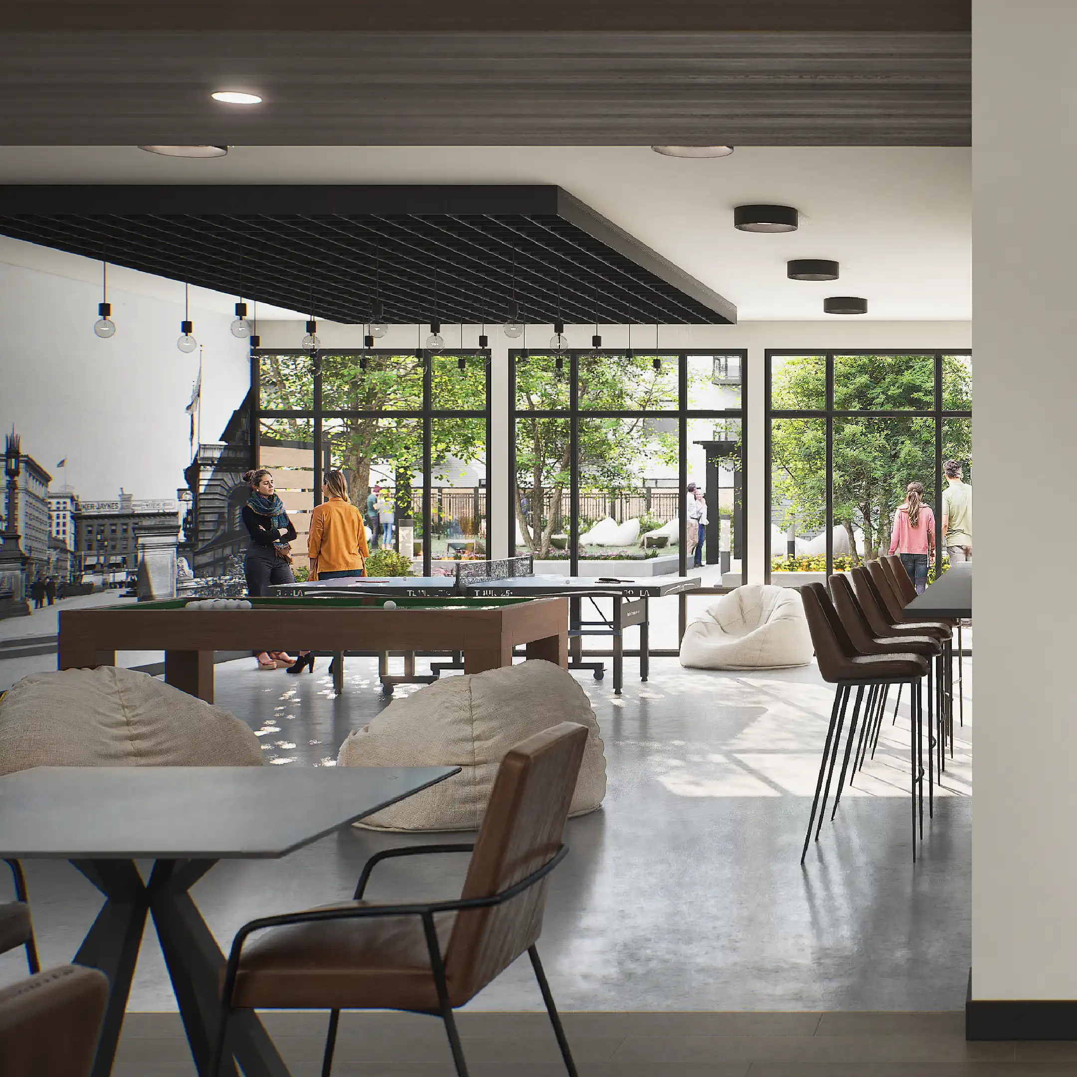 Open coworking area with natural light, modern furniture and meeting zones.