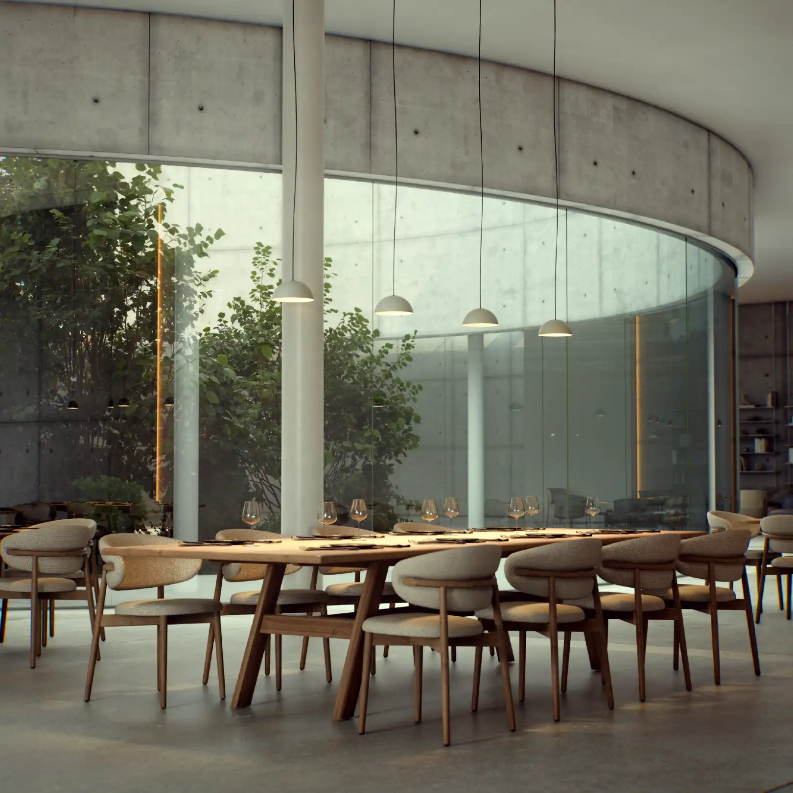 Open restaurant space with natural light and minimalist furniture.
