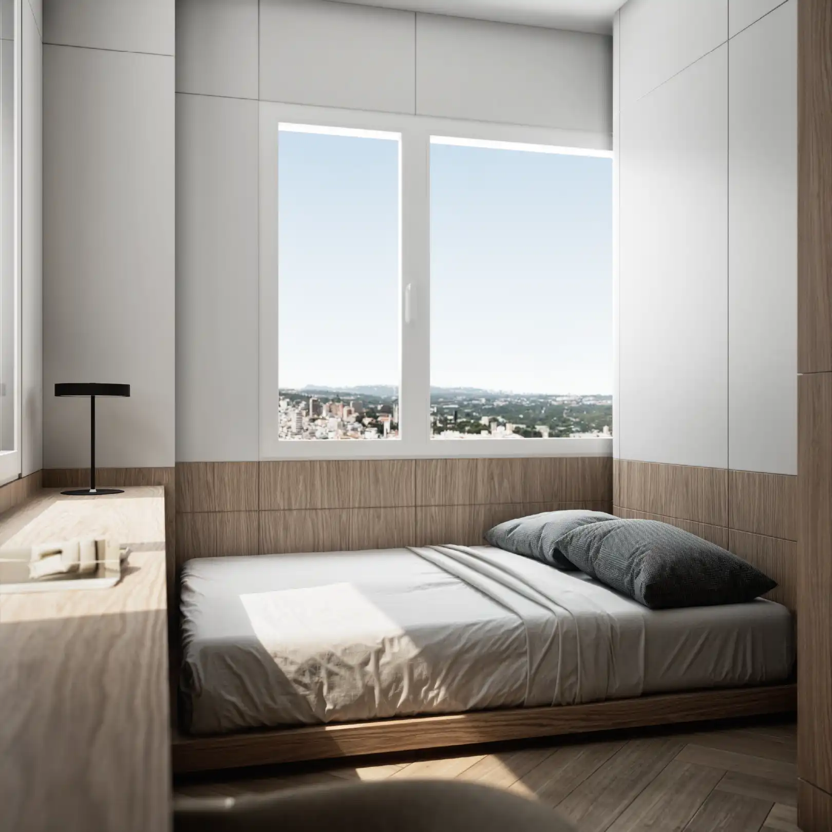 Secondary bedroom with single bed and city views through windows.